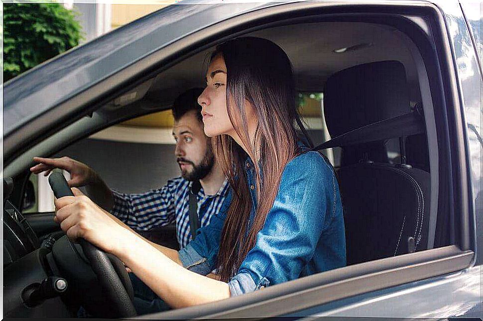 woman learning to drive a car