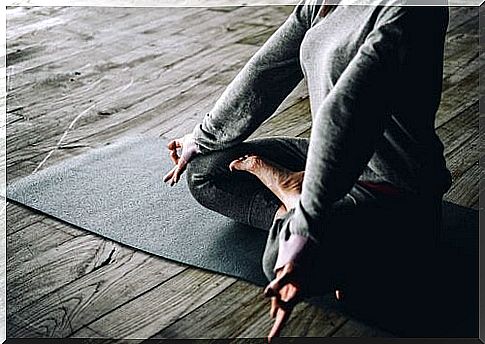 woman practicing yoga